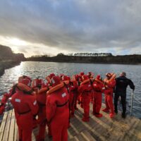 Crew on an STCW Personal Survival Techniques course